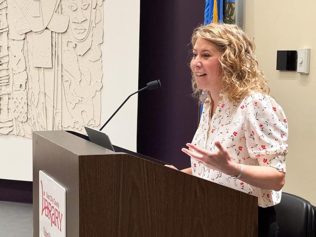 Sara Joy Proppe, consultant with church real estate consulting group Proximity Project, talks to a group of church leaders at the City of Tulsa's April 16, 2026, Connecting Mission and Place forum.