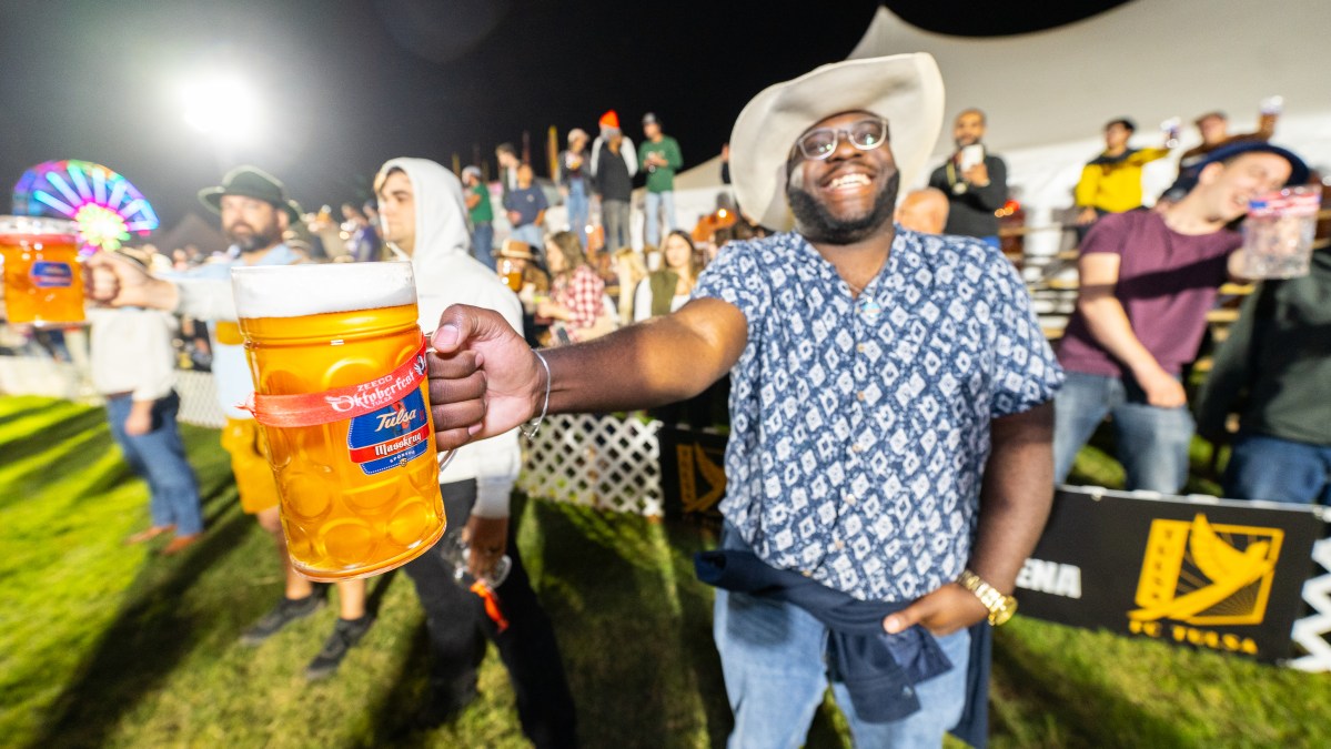 Oktoberfest attendee holding beer
