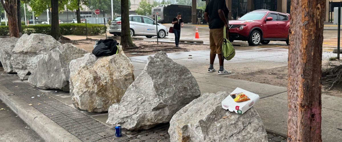 Large rocks on the sidewalk