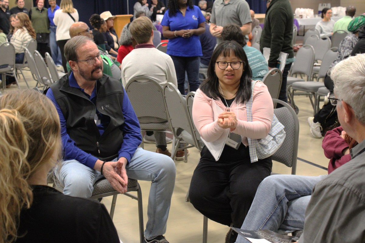 Participants and volunteers in a forum about re-entering society after incarceration at Tulsa Community College on Oct. 24, 2025