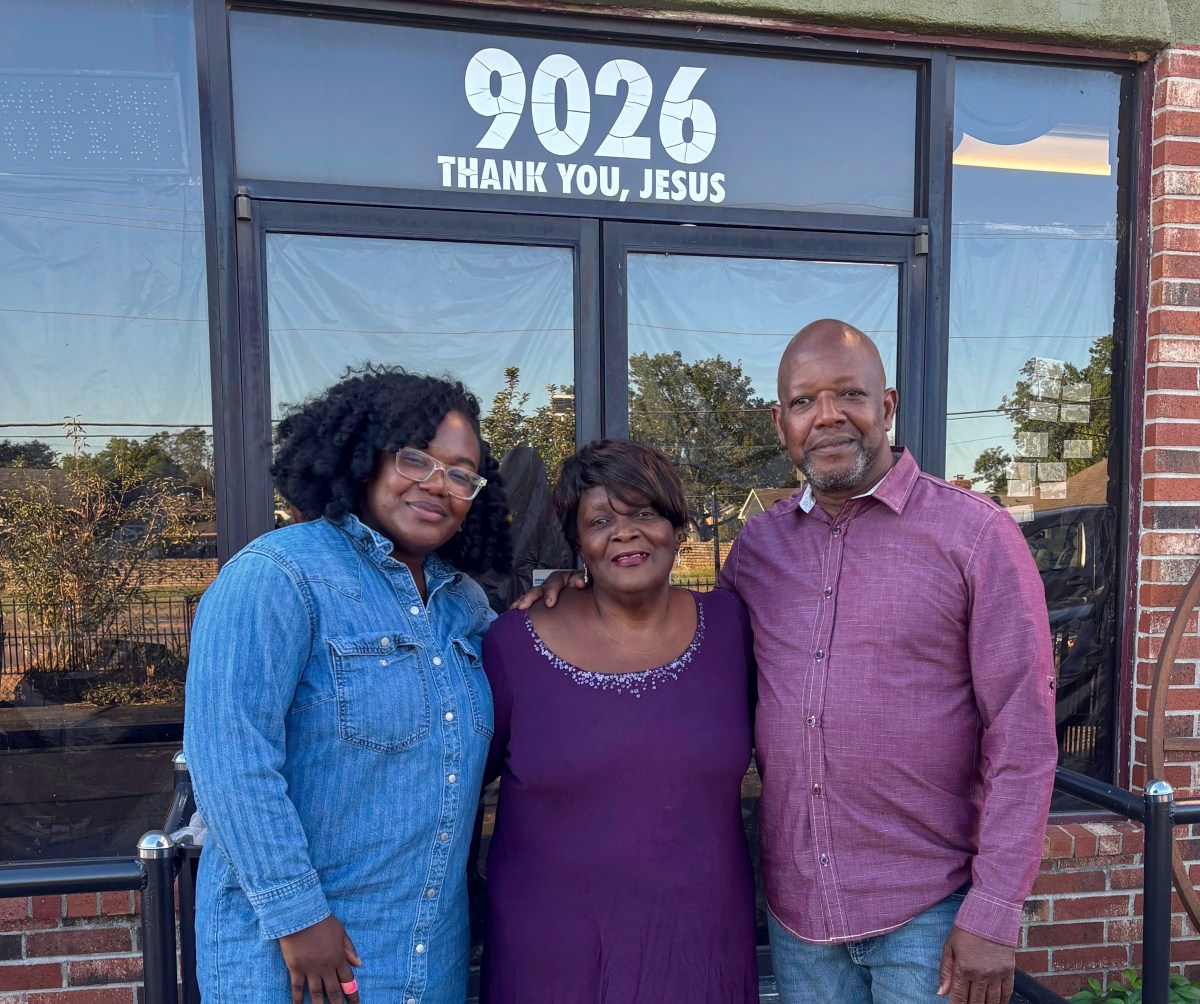 From left to right: Erica Garvin, Barbara Garvin and Eric Garvin stand outside their yet-to-open barbecue restaurant at 9026 E. 31st St. on Oct. 21, 2025.