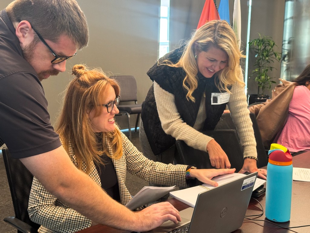 Photo of Amy McGehee and Erin Parks working