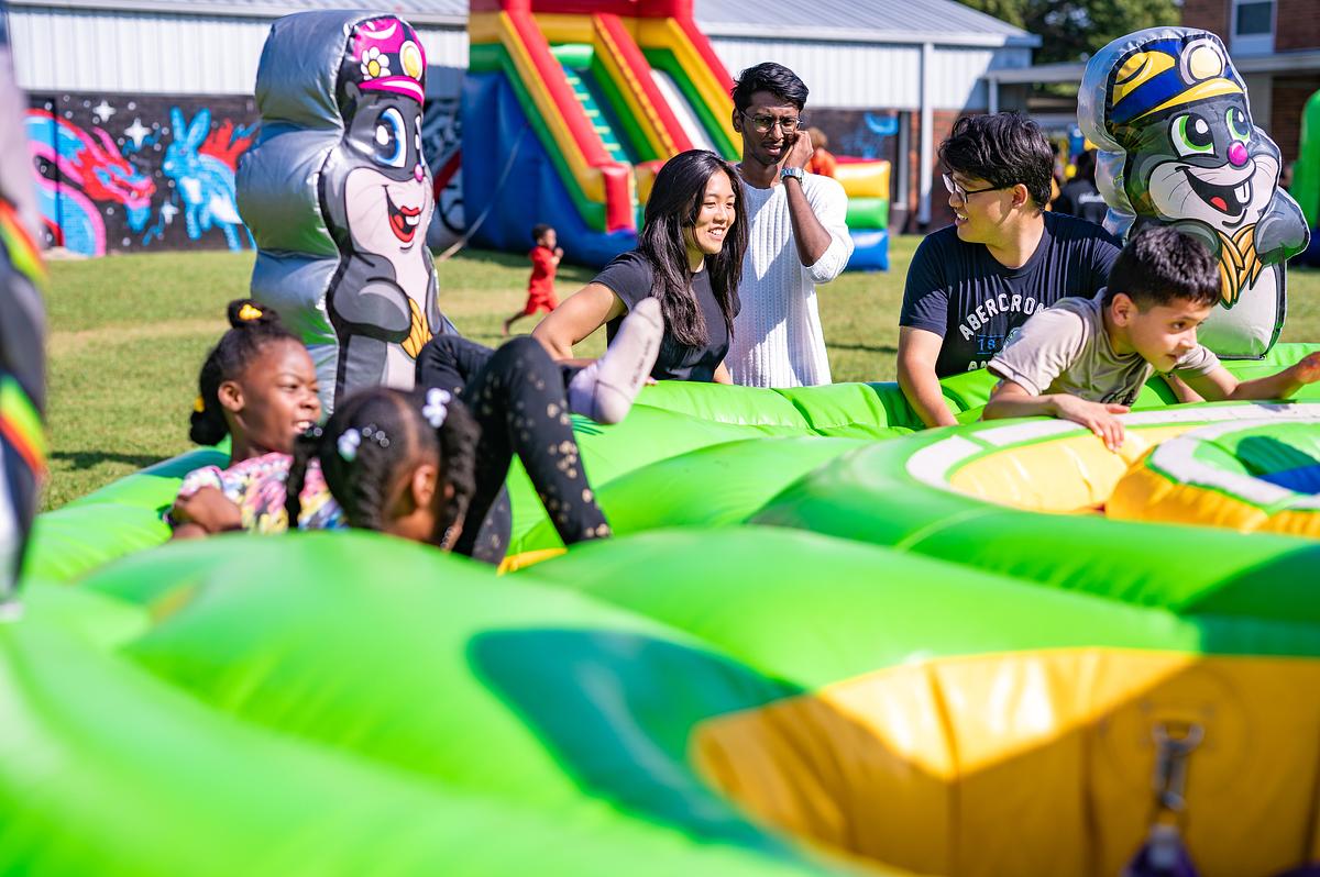 Kids play at a festival organized by Eastside Rise, an organization focused on empowering east Tulsa residents and business owners, in 2025.