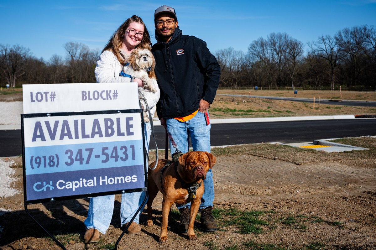Lara Gustafson, left, poses with her partner Jacob Banks