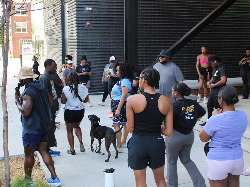 Isaac Bennett's Tulsa walking club prepares to embark on a three mile walk through downtown April 27, 2026. The group meets each Monday. 