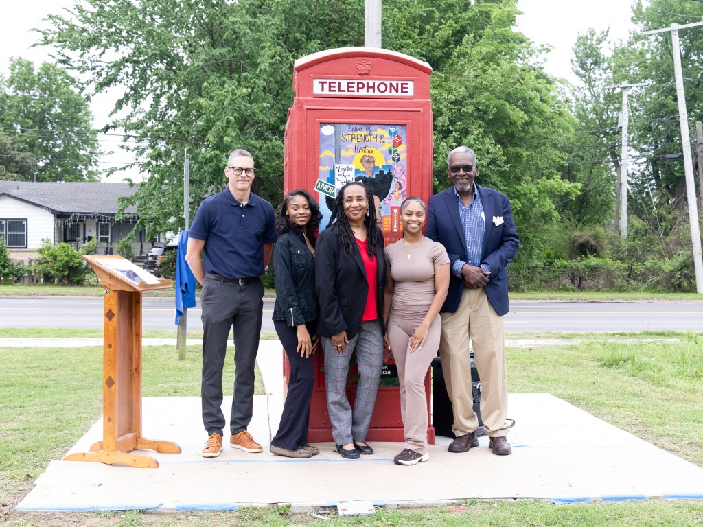 A phone booth next to Stutts House of Barbeque transformed into a public art display is unveiled April 16, 2026.