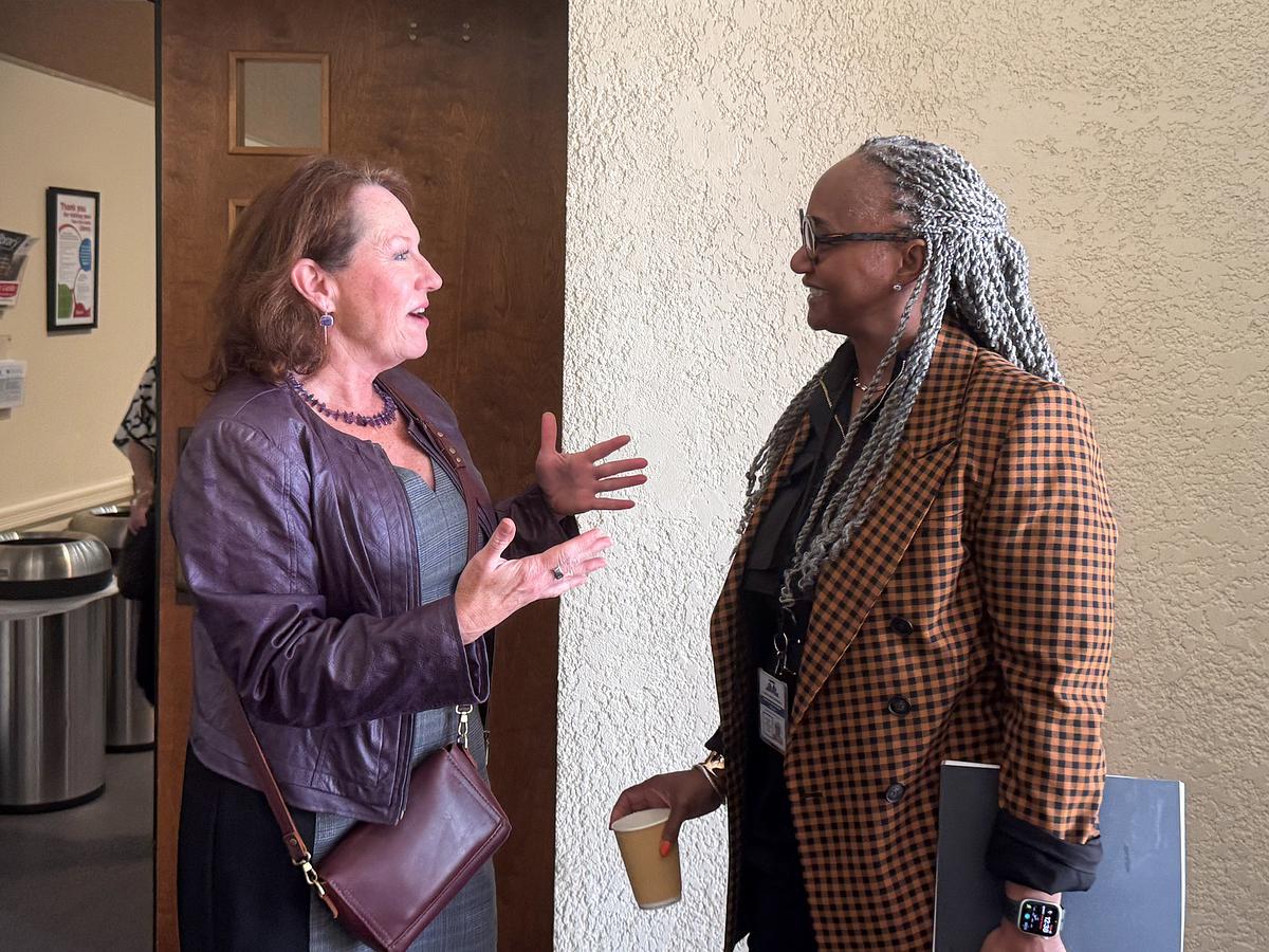 Allison Anthony of Tulsa Area United Way, right, and pastor Marla Mayberry of Antioch Baptist Church speak about Tulsa's opportunities for creating more housing with faith-based organizations during an April 16, 2026, meeting.