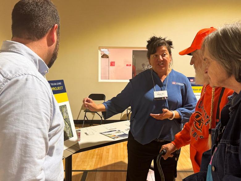 Dawn Rice, project manager with the U.S. Army Corps of Engineers, talks to northwest Tulsa homeowners about the $191 million levee improvement project during an April 30, 2026, meeting.