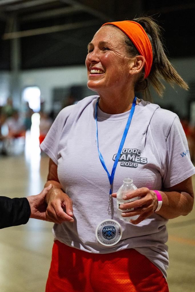An inmate smiles after receiving a medal during the first annual inmate games at Mabel Bassett Correctional Center on Friday, May 15, 2026. The games are meant to boost morale and encourage friendly competition. 
