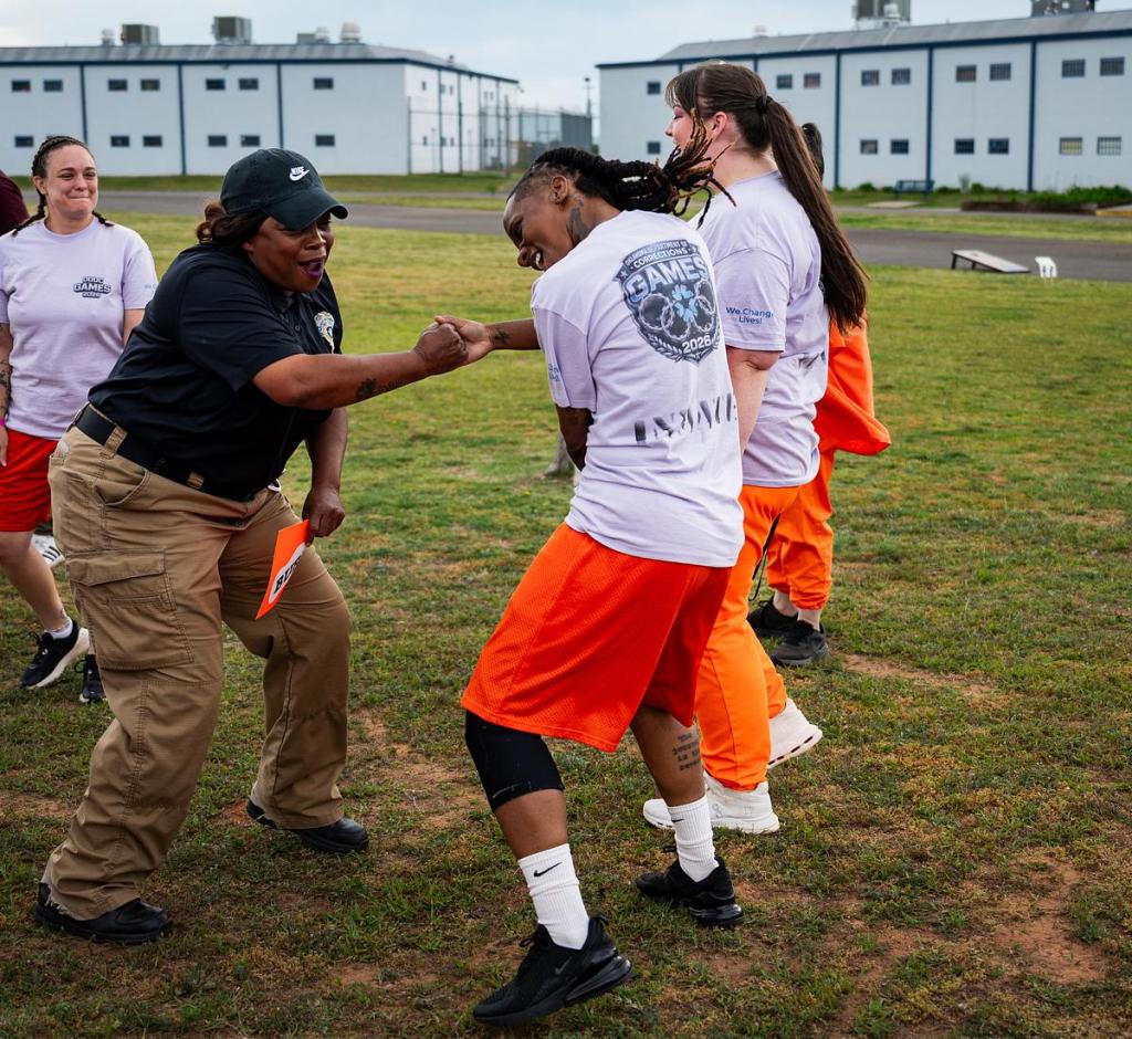 An inmate celebrates after winning her running race during the first annual inmate games at Mabel Bassett Correctional Center on Friday, May 15, 2026. The games are meant to boost morale and encourage friendly competition. 
