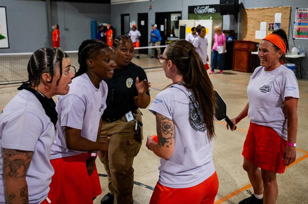 Inmates hype each other up during a pickleball game during the first annual inmate games at Mabel Bassett Correctional Center on Friday, May 15, 2026. The games are meant to boost morale and encourage friendly competition. 