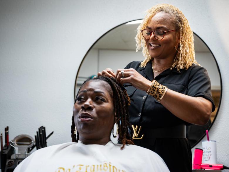 Tonya Johnson styles Joyce Lowe's hair at Nu Xpressions on Tuesday, May 21, 2026. Johnson has been doing hair for nearly 30 years.