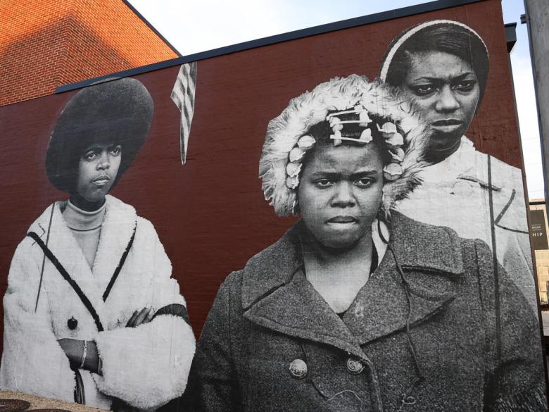 A new mural by Tatyana Fazlalizadeh on the north side of the Tulsa Artist Fellowship Studios at 109 MLK Jr. Blvd.