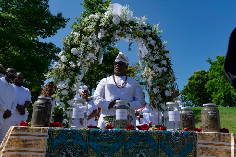 Chief Egunwale Amusan and members of the Tulsa African Ancestral Society perform a May 31, 2026, soil collection ceremony to honor victims and survivors of the 1921 Tulsa Race Massacre.