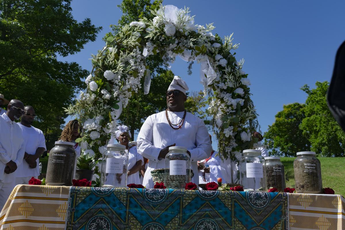 Chief Egunwale Amusan and members of the Tulsa African Ancestral Society perform a May 31, 2026, soil collection ceremony to honor victims and survivors of the 1921 Tulsa Race Massacre.