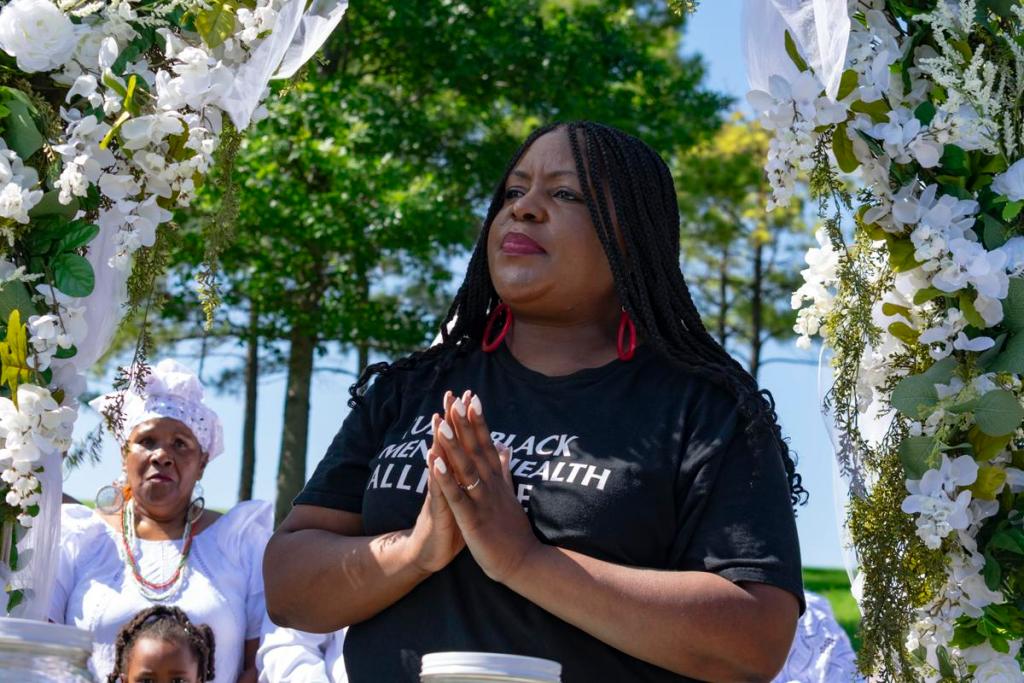 Tiffany Crutcher, founder and executive director of the Terence Crutcher Foundation, looks on during a May 31, 2026, soil collection ceremony honoring survivors and victims of the 1921 Tulsa Race Massacre.