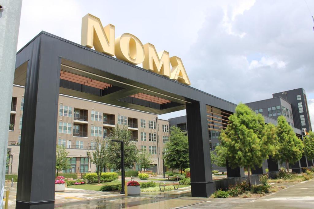 The NOMA complex, pictured July 17, 2026, has brought more than 250 apartments and new retail to Route 66 since opening in 2024.