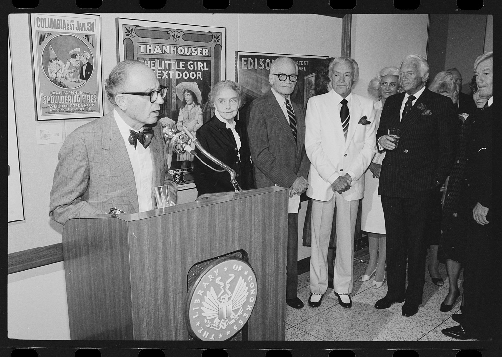 Daniel J. Boorstin stands at podium before group